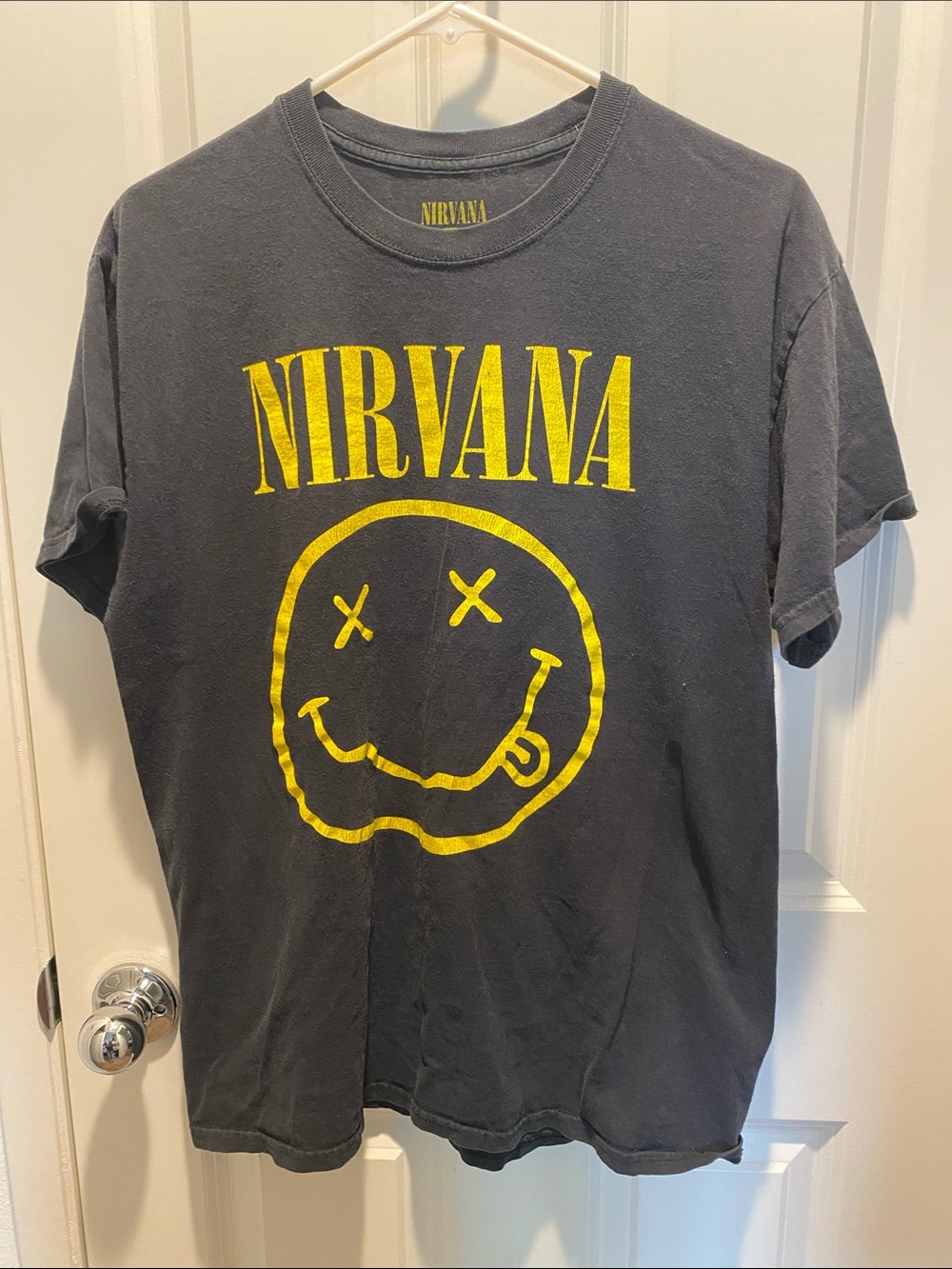 NIRVANA Black Short-Sleeve Tee with Yellow Smiley Graphic